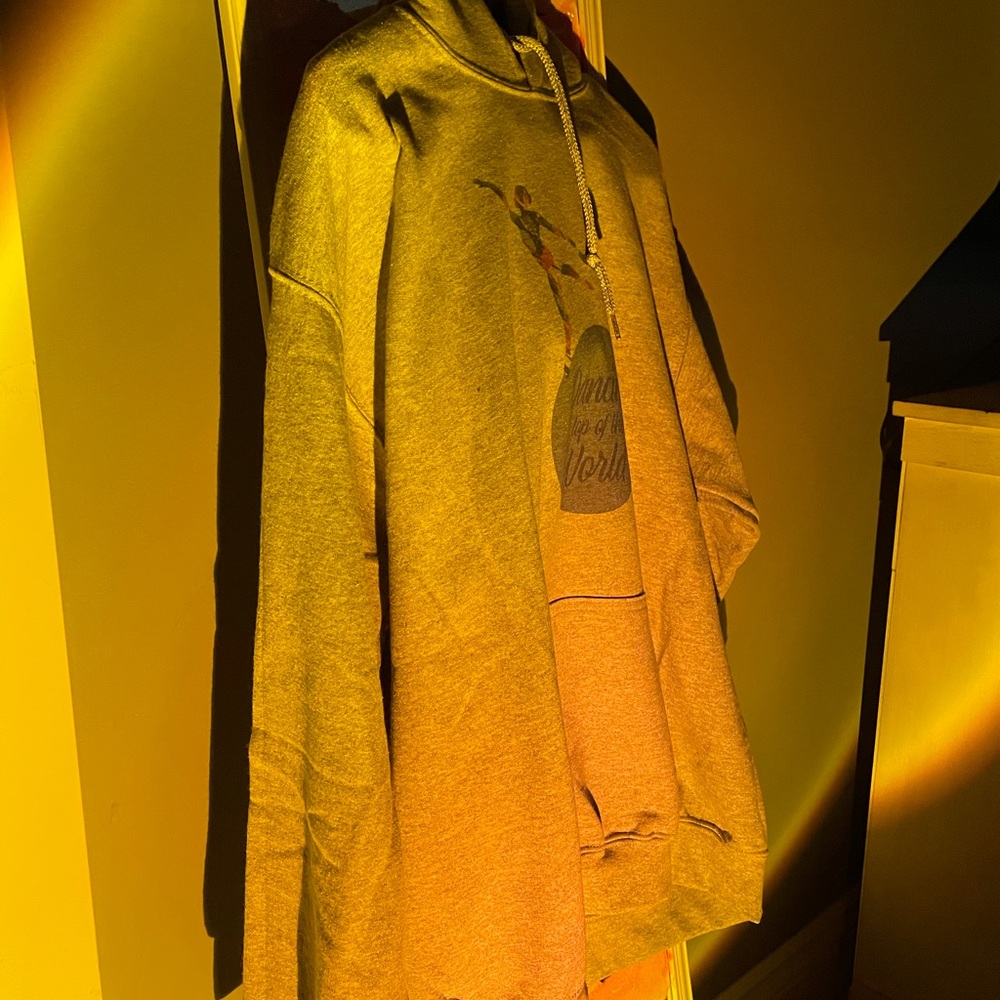 Grey dance sweatshirt brand is Gildan